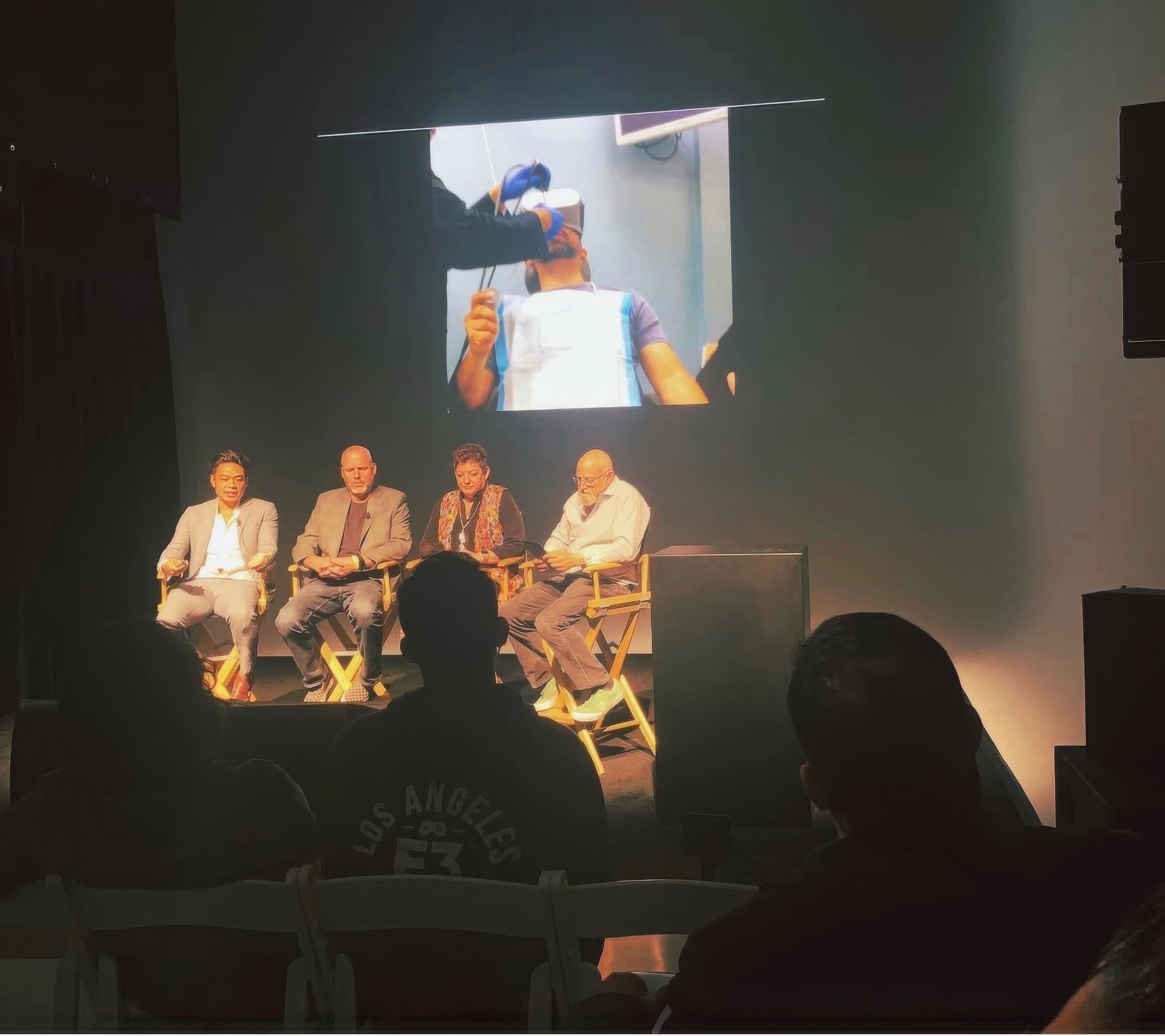 Dr. Alfred Iloreta on stage during a keynote panel on mixed reality and augmented reality in skull base surgery